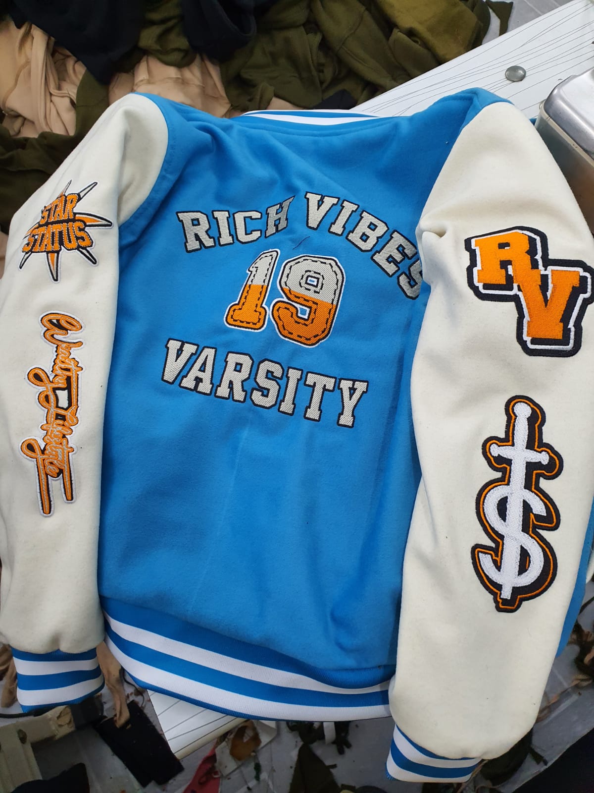 PREMIUM RICH VIBES VARSITY JACKET BABY BLUE/ORANGE🔥🔥 - Rich Vibes Apparel